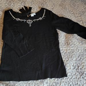 Black sweater with sewn on gems